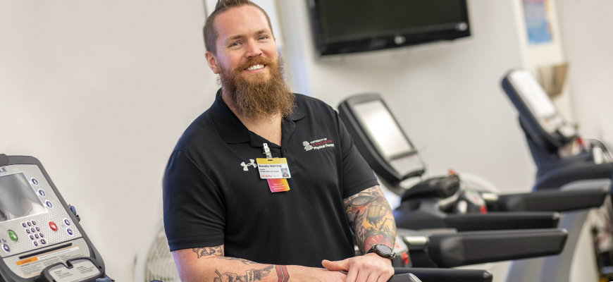 this photo shows military veteran Brooks Herring in a physical therapy facility at the University of South Carolina