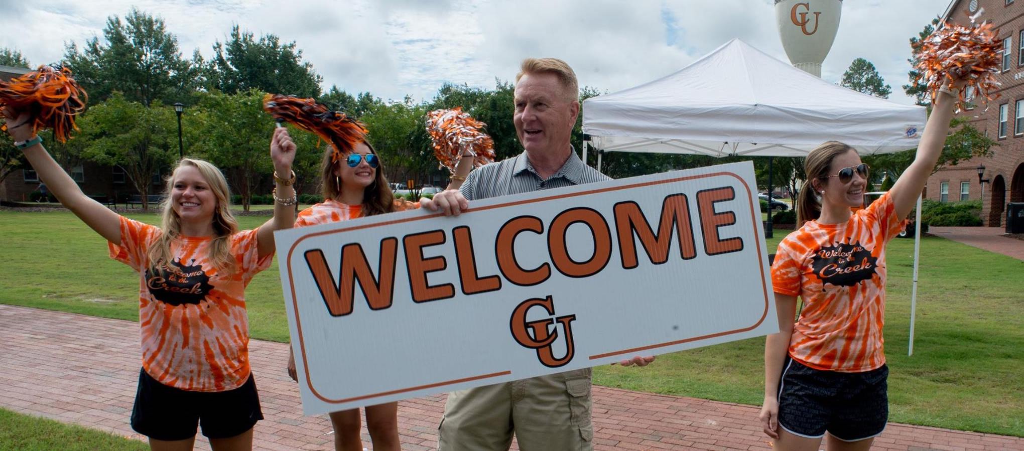 photo of group welcoming new students to Campbell University, which now provides free rooms to all students due to the coronavirus pandemic