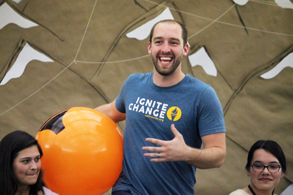 this photo shows the fun energy that Chad Littlefield brings to his Ignite Retreat presentations