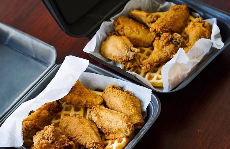 this photo shows fried chicken and other soul food from D Cafe, a Black-owned restaurant benefiting from Black and Mobile's food delivery service in Atlanta