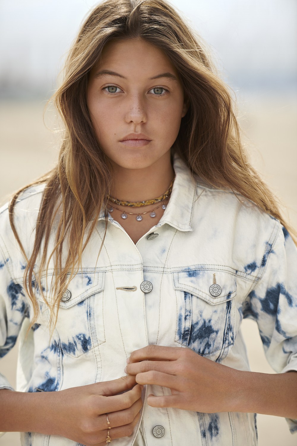 a photo of a young woman modeling sustainable fashion from the Gap Teen line