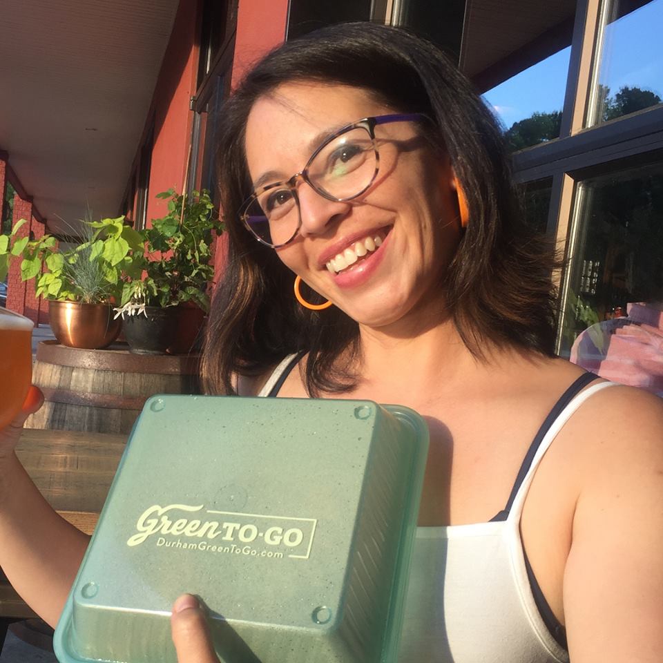 this photo depicts both the GreenToGo reusable container and its creator, Crystal Dreisbach
