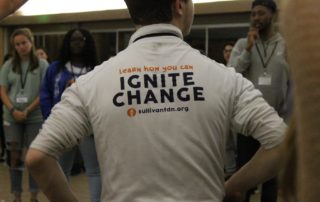 this photo reinforces the Ignite Retreat message through a logoed t-shirt