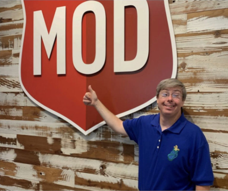 this photo shows a MOD Pizza employee, Eddy Barnhill, who has an intellectual/developmental disability