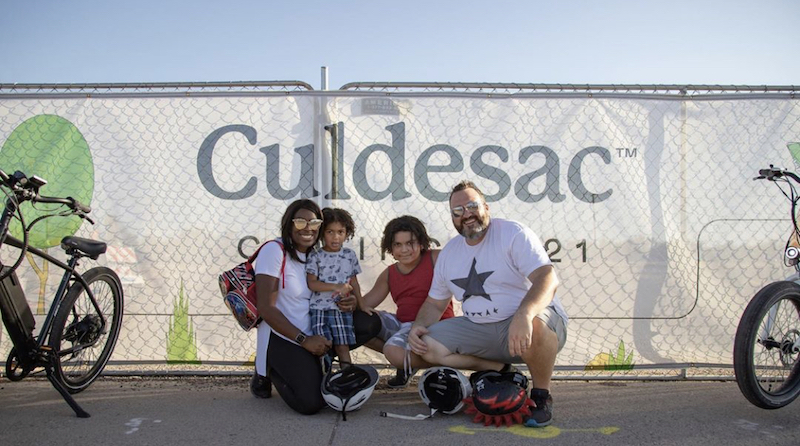 this photo shows a family that will be living in the car-free community of Culdesac Tempe in Tempe, Arizona.