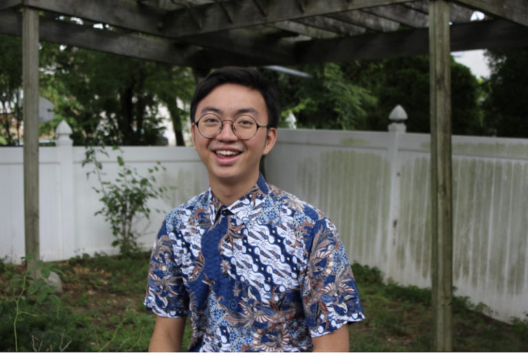 this is a photo of Dustin Liu, UNA-USA Youth Observer to the UN, in his back yard