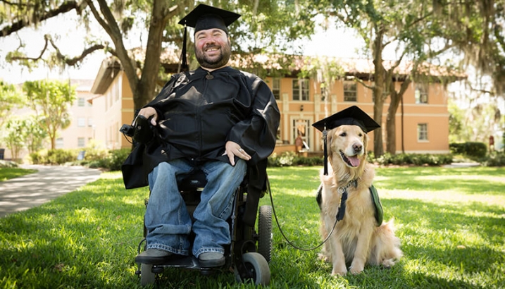 this photo shows a service dog with an owner who has a disability