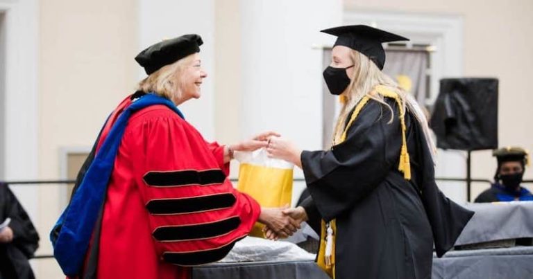 this photo shows Mary Baldwin University president Pamela Fox presenting the Algernon Sydney Sullivan Award to Kylie Stottlemyer