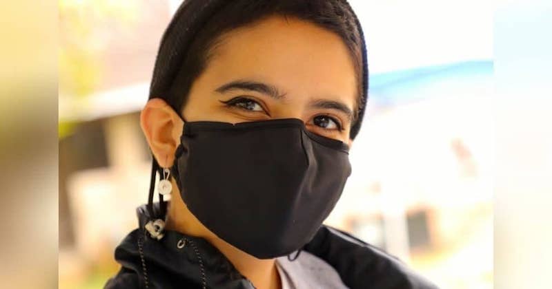 this photo shows Lexi Tavakoli, a student in Mary Baldwin University's Program for the Exceptionally Gifted, wearing her mask while volunteering for the Out of the Darkness Walk