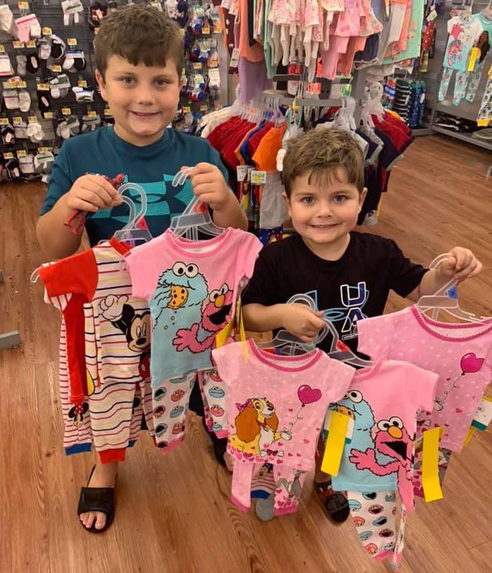 this photo shows two little boys with medically adapted pajamas from the #NoahNation Foundation