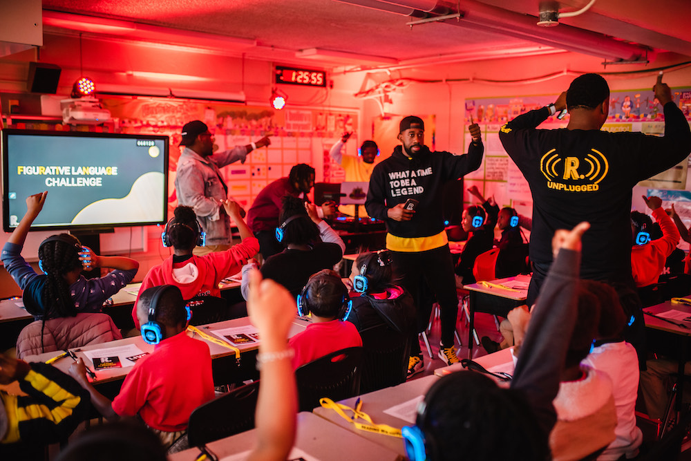 this is a photo of a Reading With a Rapper class in action