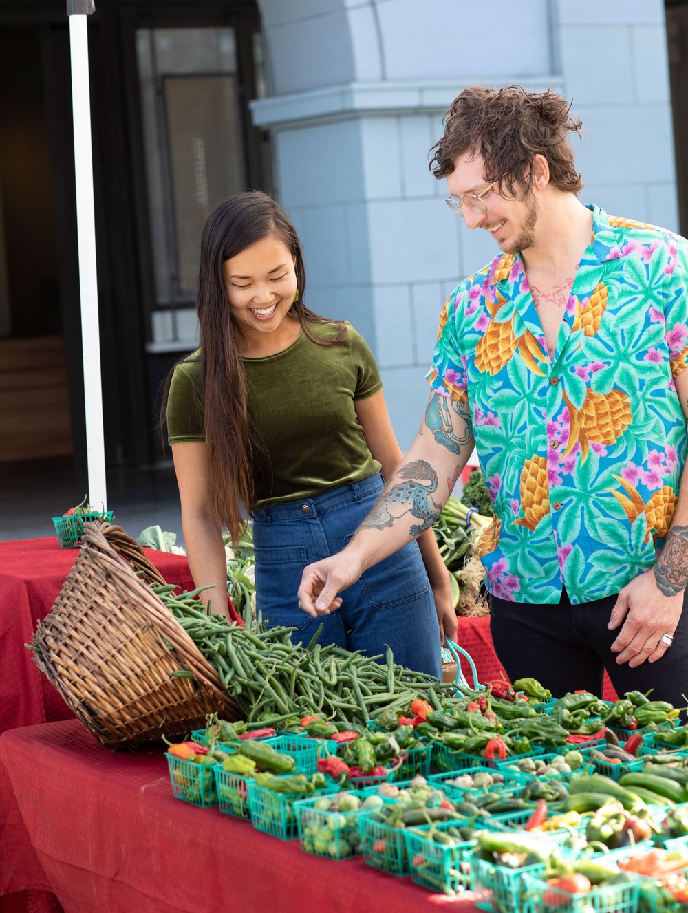 this photo shows Kayla Abe and David Murphy, founders of a sustainable restaurant using food waste as its main ingredients