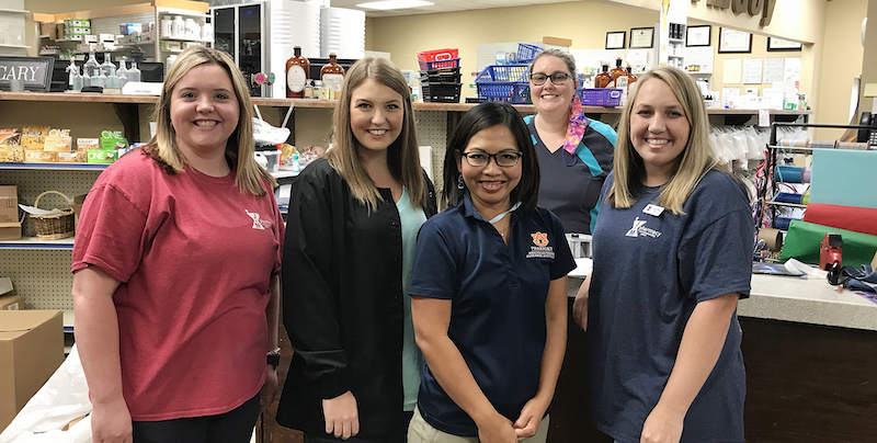 this photo shows a group of Auburn students who are working to save rural pharmacies in the southeastern U.S.