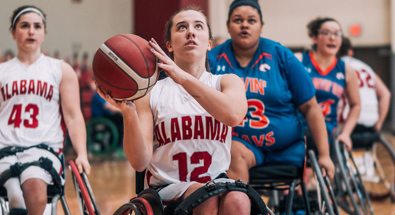this photo shows Abby Bauleke, a women's wheelchair basketball athlete whose team won the bronze medal at the Tokyo Paralympics