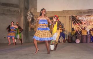 this photo shows Dani Biggs performing a West African dance number
