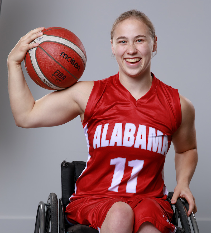 this photo shows Lindsey Brugg, an athlete who plays on the University of Alabama's women's wheelchair basketball team