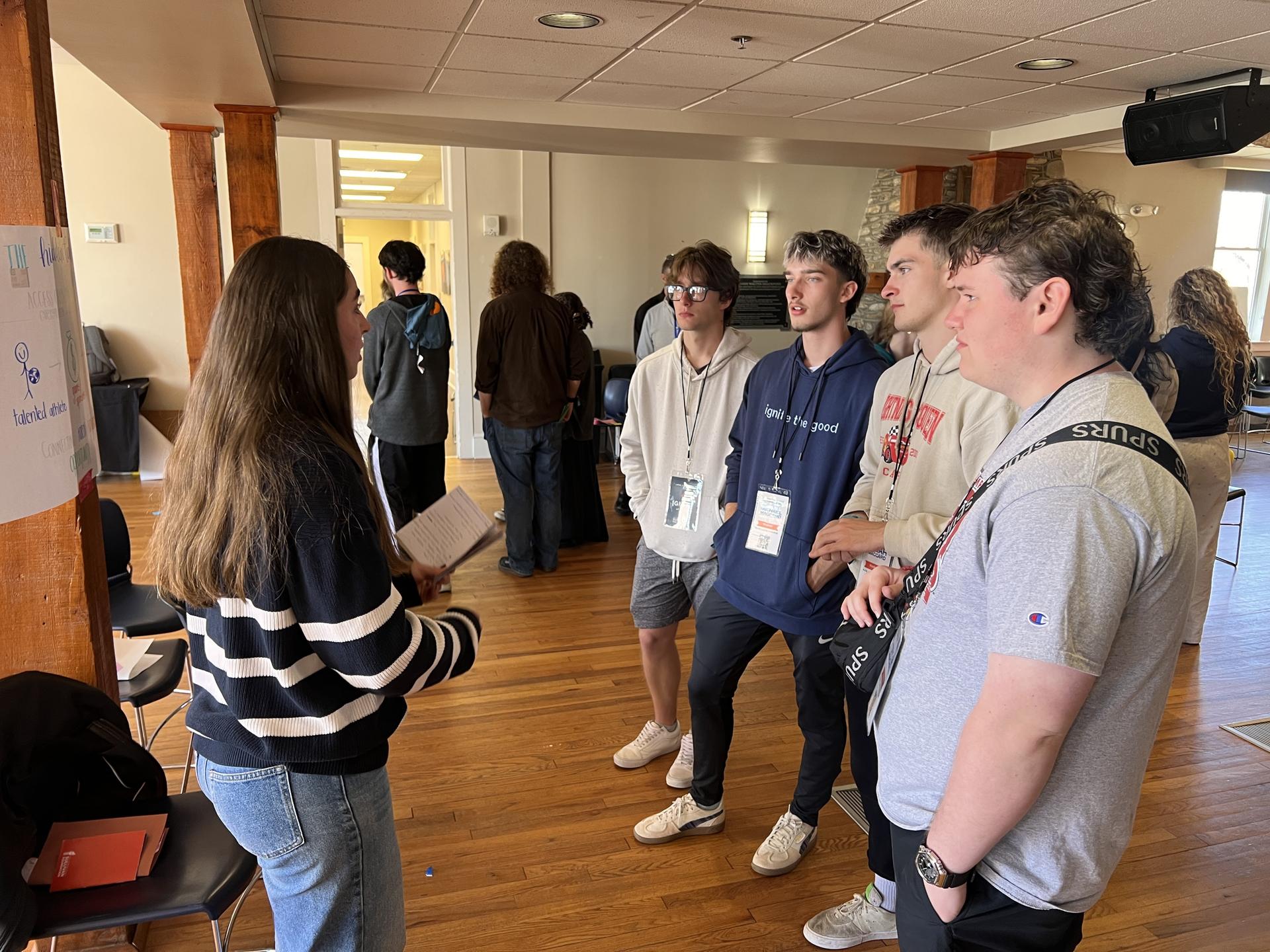 Students discuss a project at Ignite, Spring 2026 Participants discuss a project idea at the Spring 2026 Ignite Retreat.